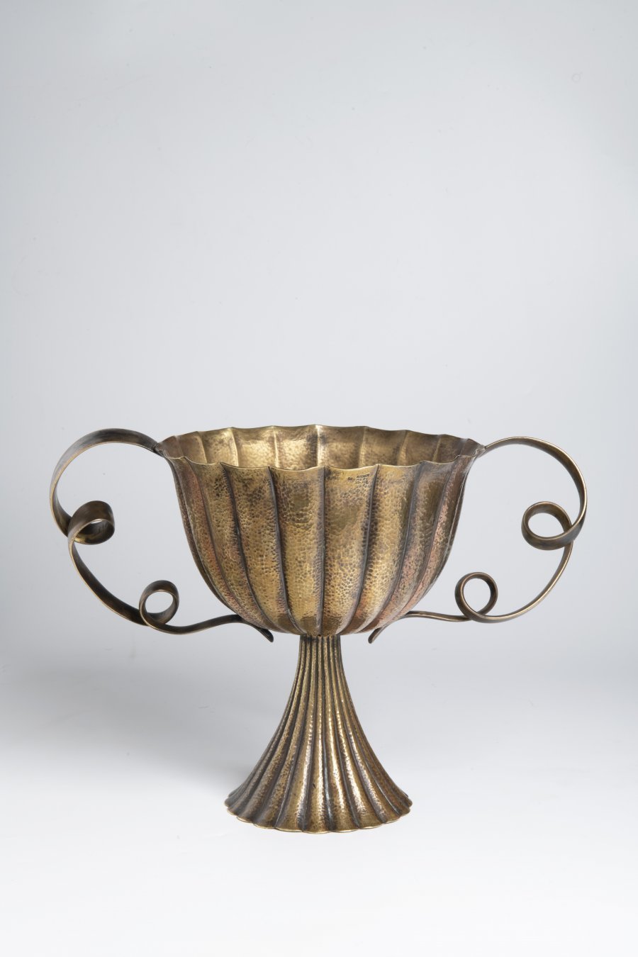 A BRASS CENTREPIECE