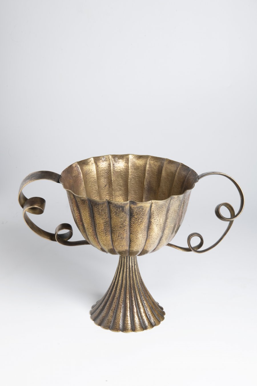 A BRASS CENTREPIECE