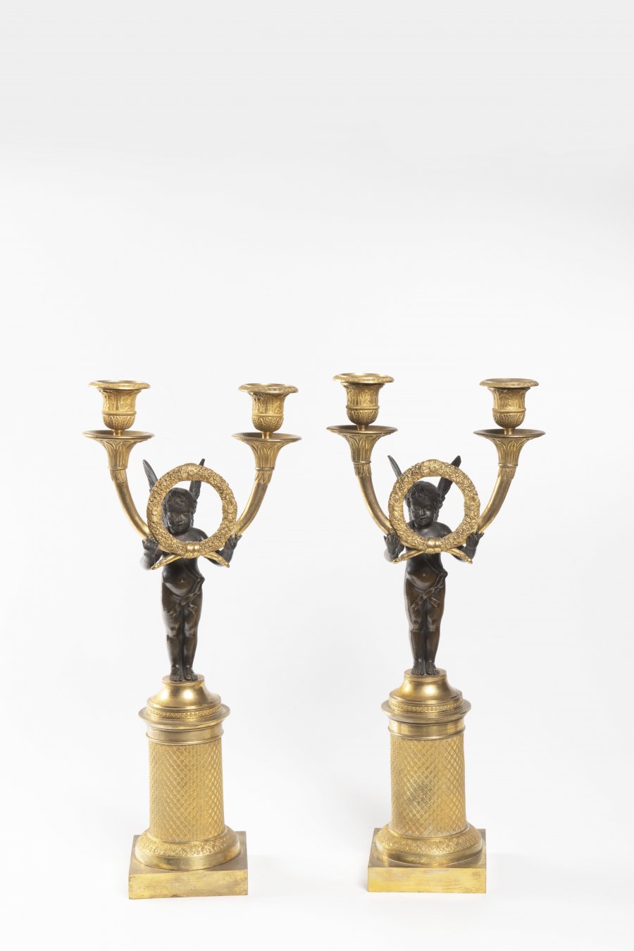 PAIRED EMPIRE CANDLESTICKS
