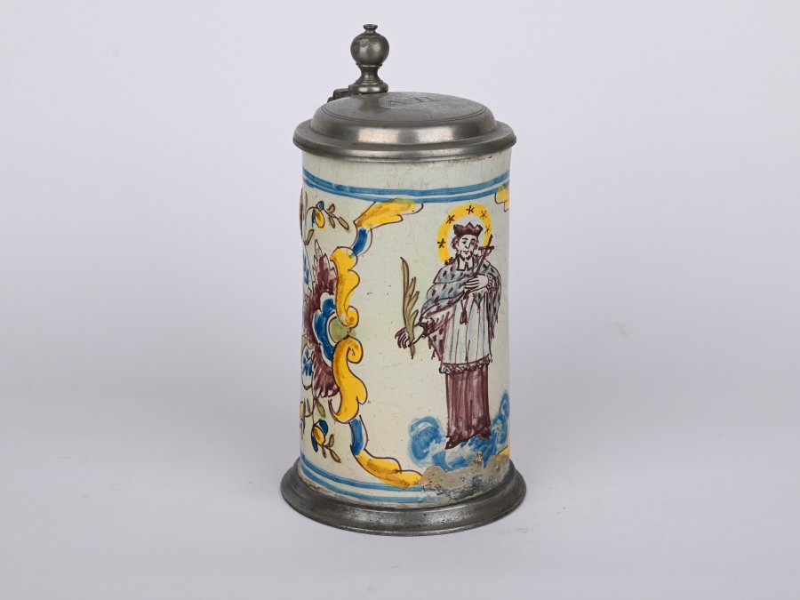 A JUG WITH A LID