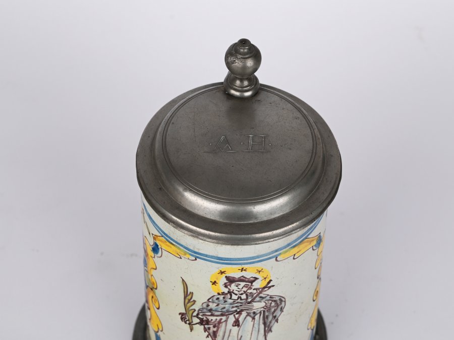 A JUG WITH A LID