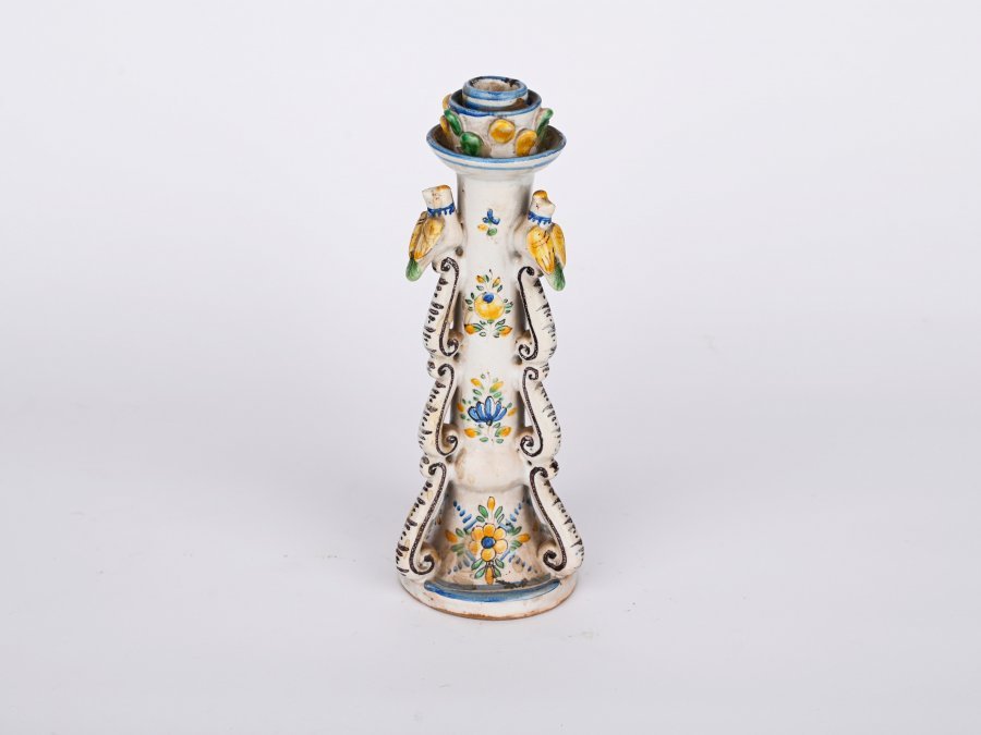 A CERAMIC STUPAVA CANDLESTICK