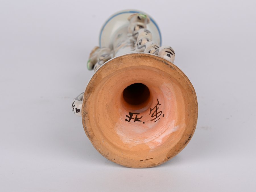 A CERAMIC STUPAVA CANDLESTICK