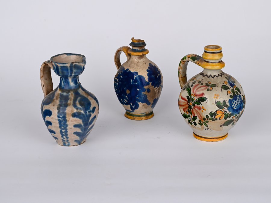 A SET OF THREE MORAVIAN CERAMIC JUGS