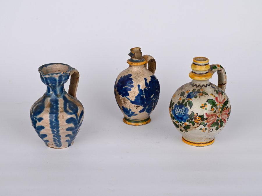 A SET OF THREE MORAVIAN CERAMIC JUGS