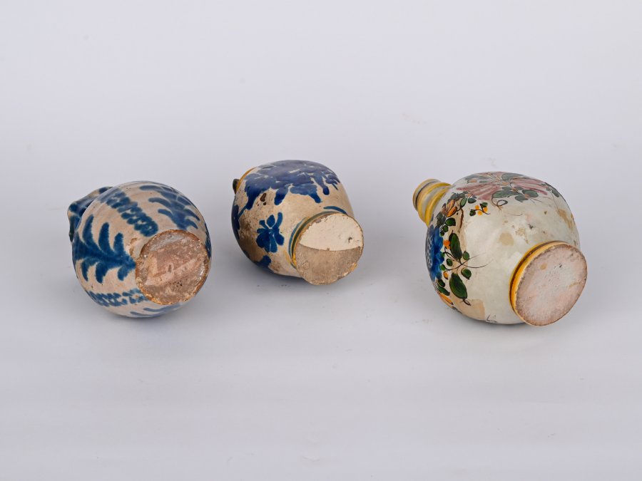 A SET OF THREE MORAVIAN CERAMIC JUGS