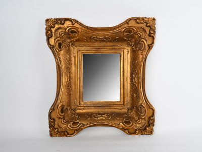 RICHLY CARVED MIRROR