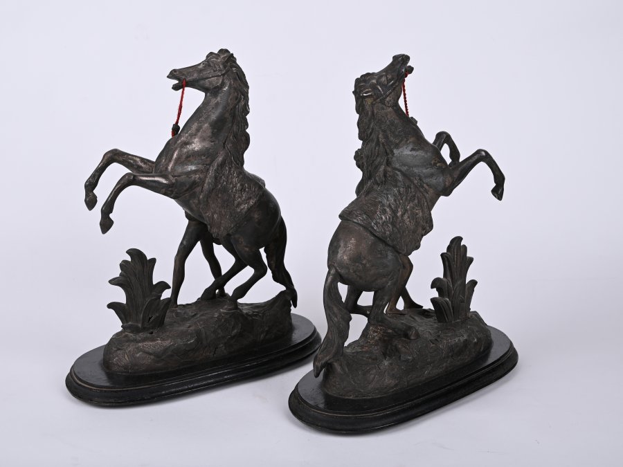 PAIRED HORSE SCULPTURES