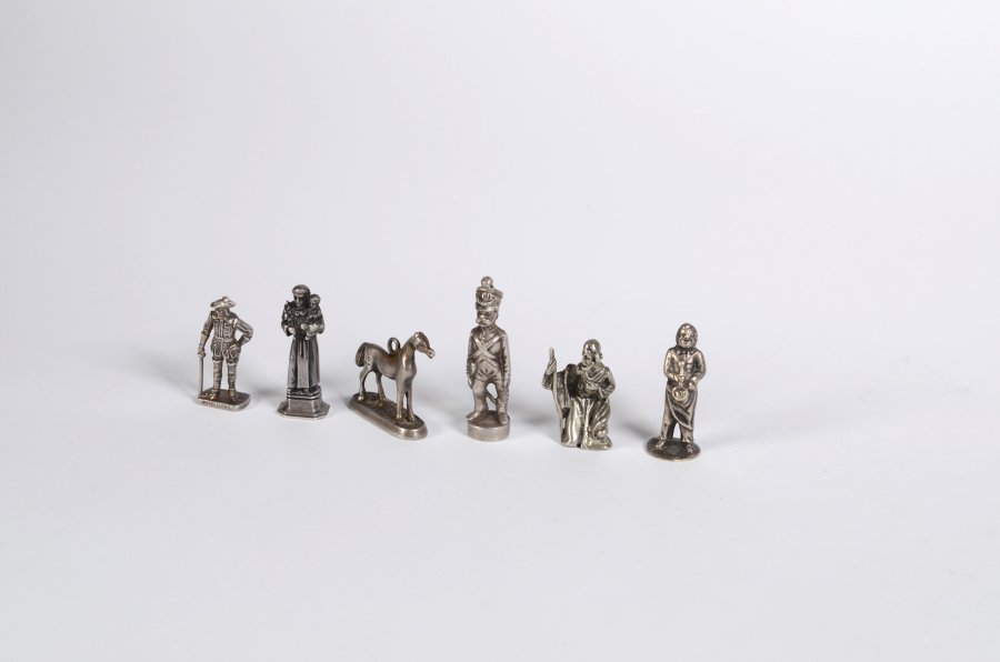 SET OF SILVER FIGURINES