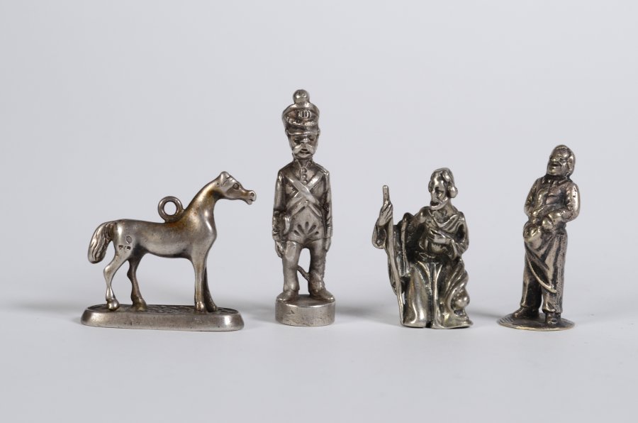 SET OF SILVER FIGURINES