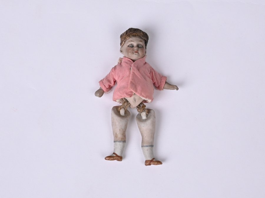 PORCELAIN WINKING DOLL