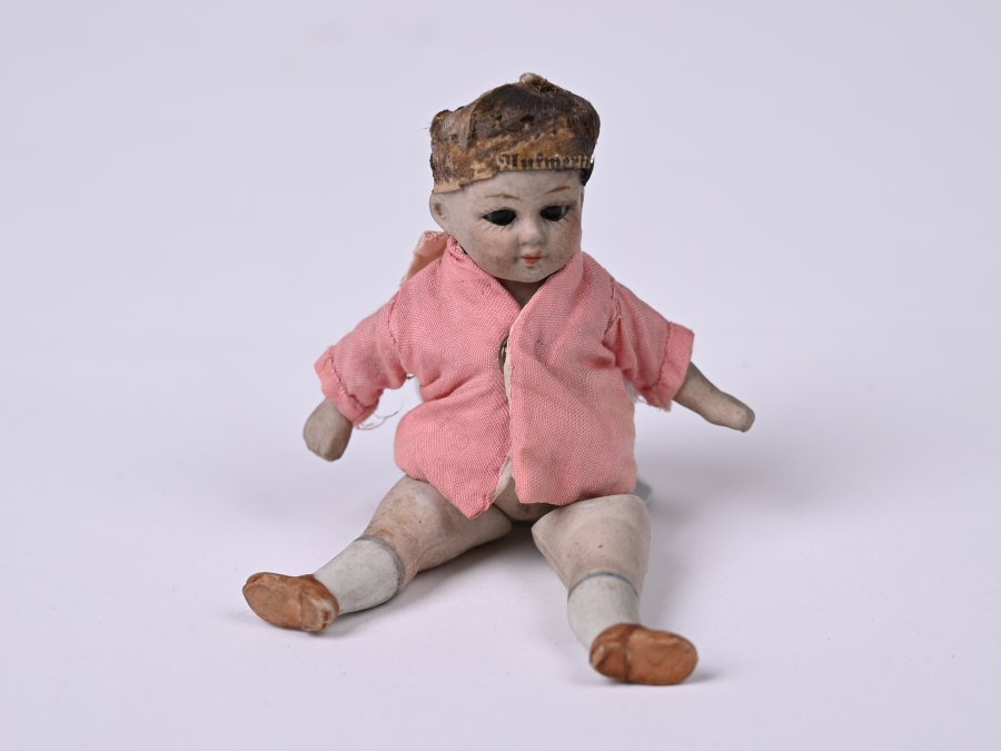 PORCELAIN WINKING DOLL