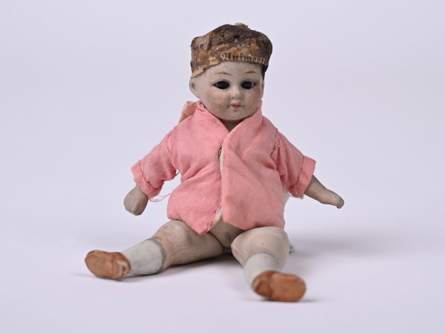 PORCELAIN WINKING DOLL