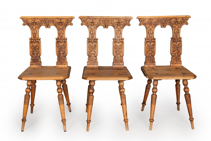 A SET OF THREE FOLK CHAIRS