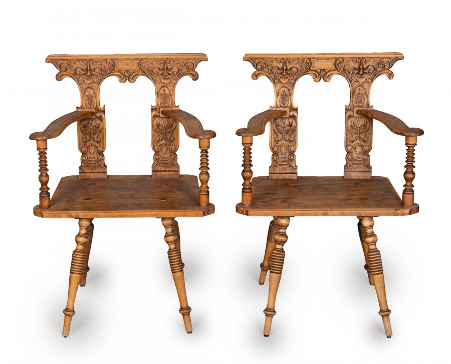 TWO FOLK CHAIRS WITH ARMRESTS