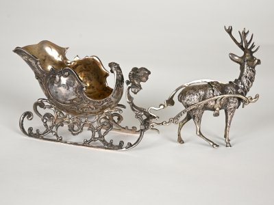 SLEIGH DRAWN BY A DEER