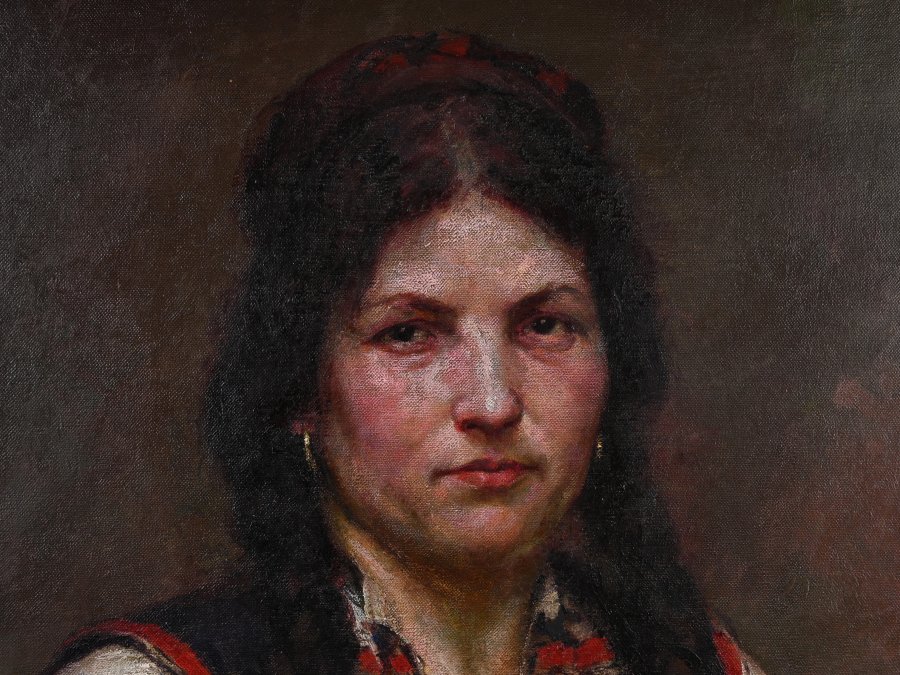 WOMAN IN A FOLK DRESS