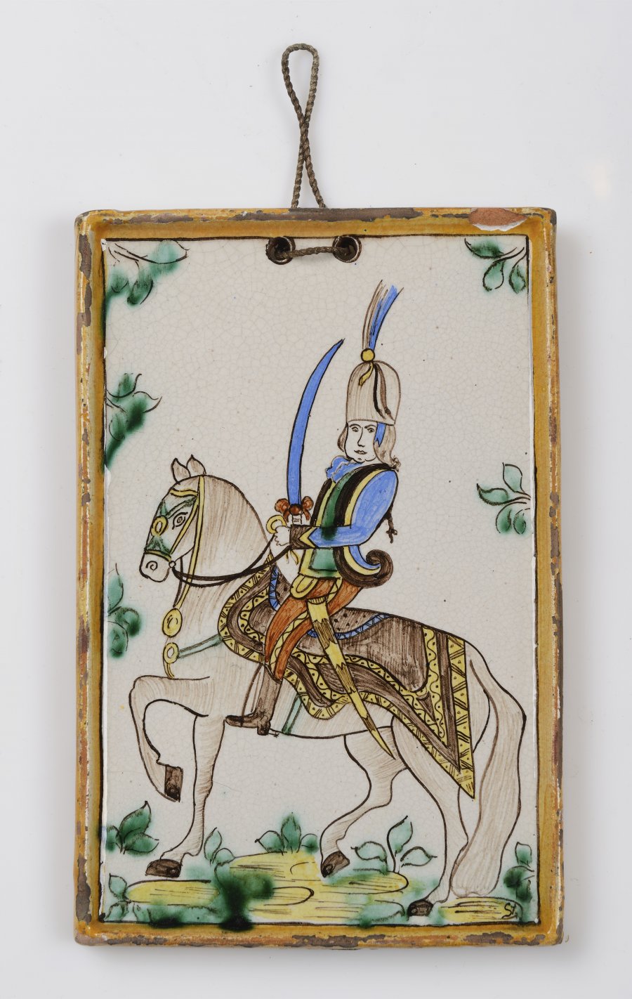 A Pair of Faïence Pictures with a Hussar Motif