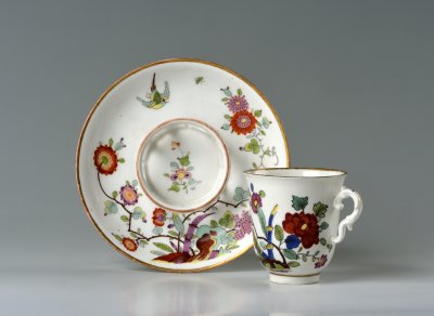 A CUP AND SAUCER