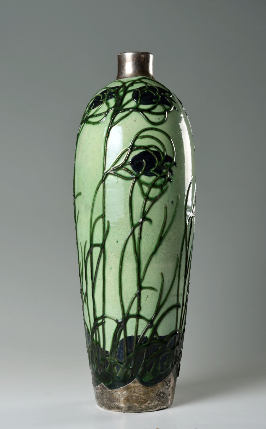 A VASE IN SILVER ARMATURE