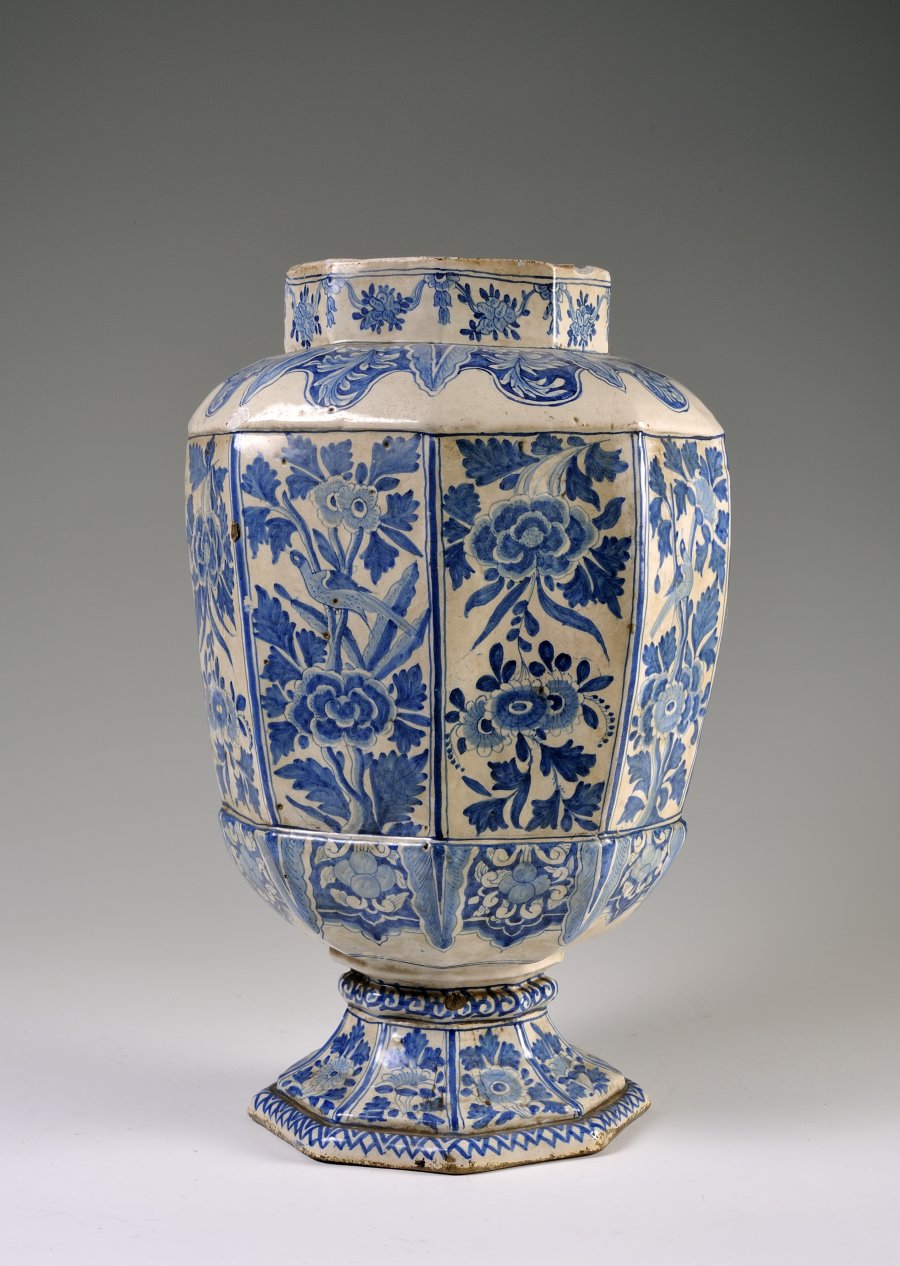 A TALL FOOTED VASE
