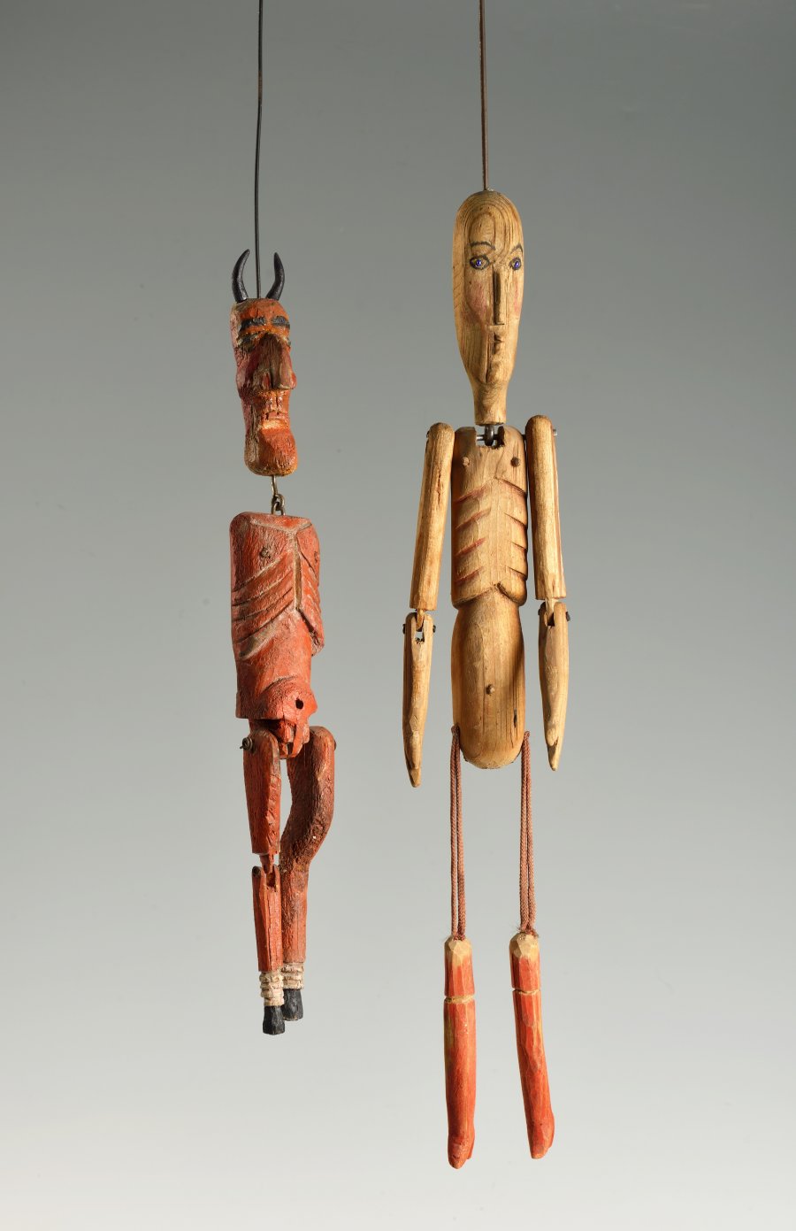 A PAIR OF WOODEN PUPPETS