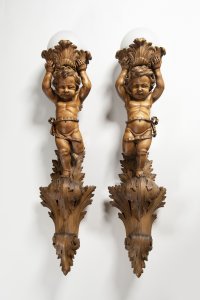 PAIR OF FIGURAL APPLIQUES