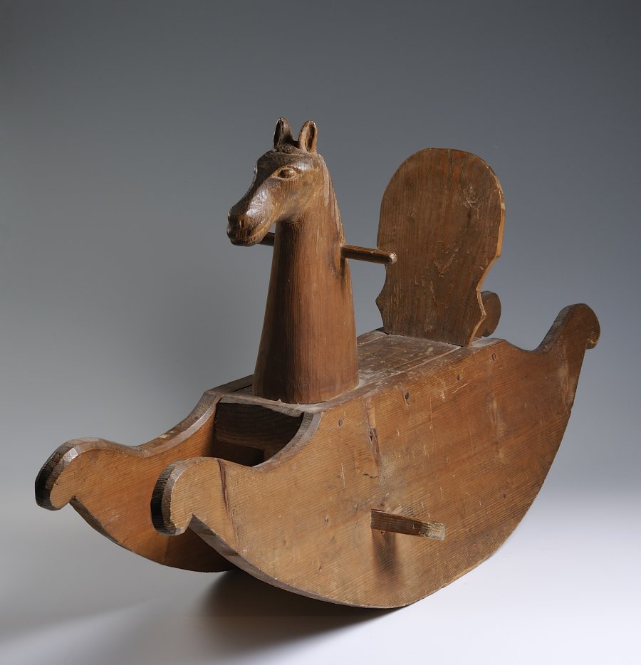 A SPRUCEWOOD ROCKING HORSE