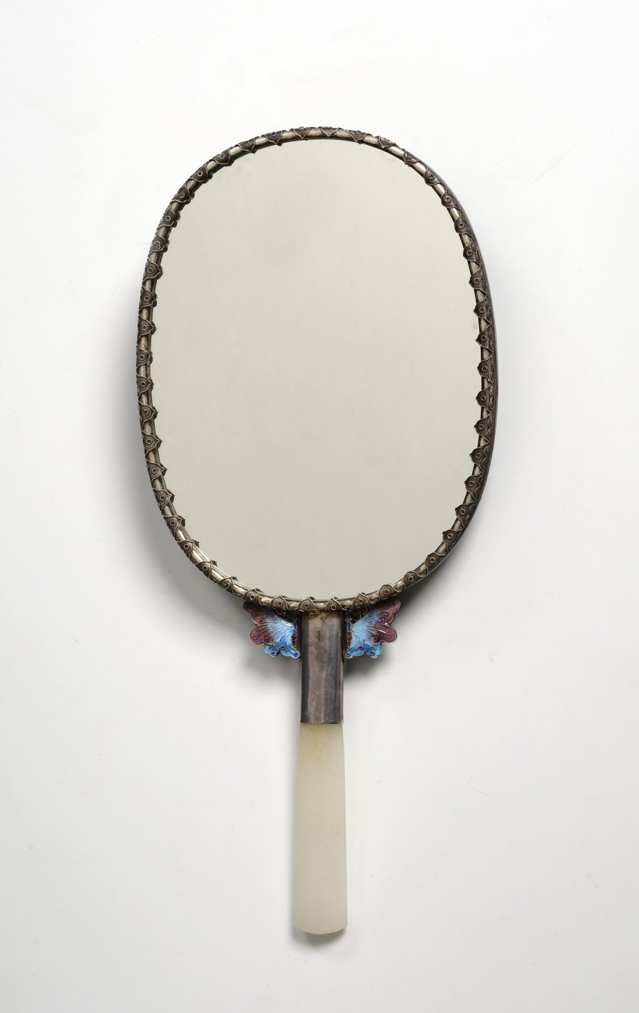 A HANDHELD MIRROR