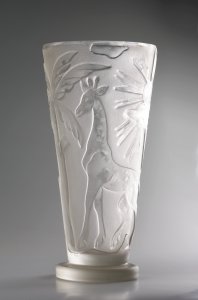 A VASE WITH A GIRAFFE AND PELICAN MOTIF