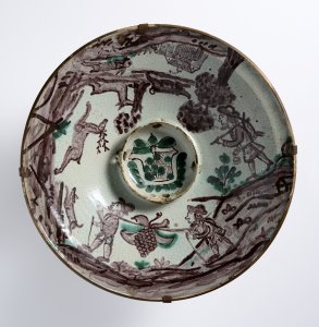 A PLATE WITH HUNTING MOTIFS