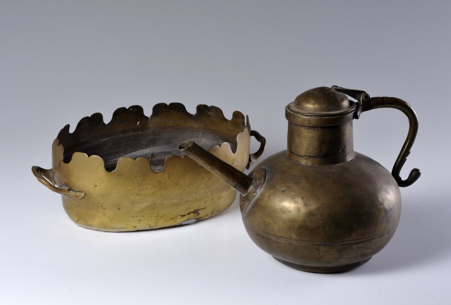 A BRASS WINE GLASS CHILLER AND A JUG