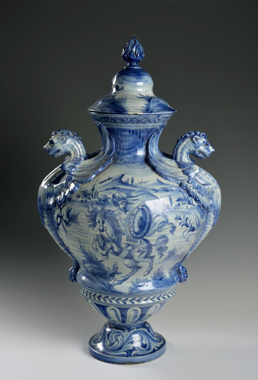 A VASE WITH A LID