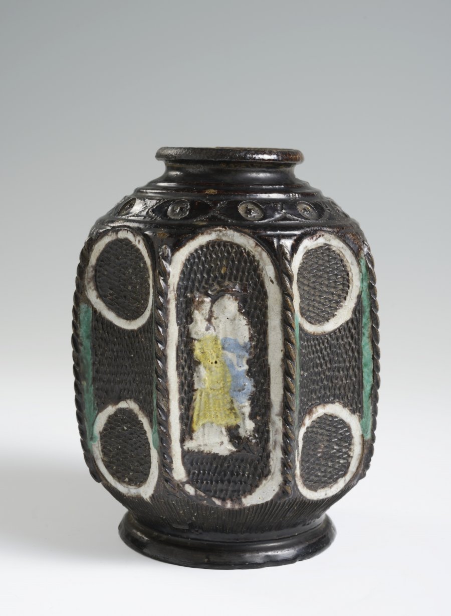 A SALT GLAZED BOTTLE WITH RELIEFS