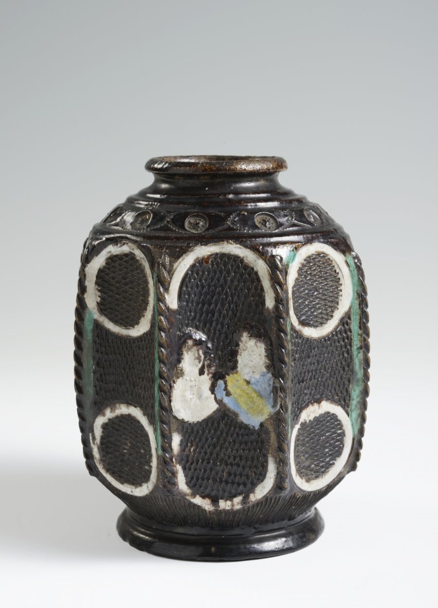 A SALT GLAZED BOTTLE WITH RELIEFS