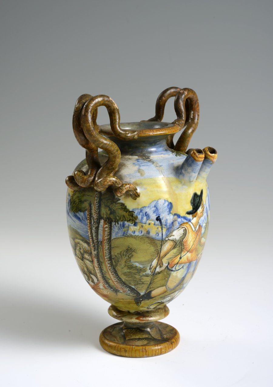 A MAJOLICA APOTHECARY JAR WITH A HUNTING SCENE