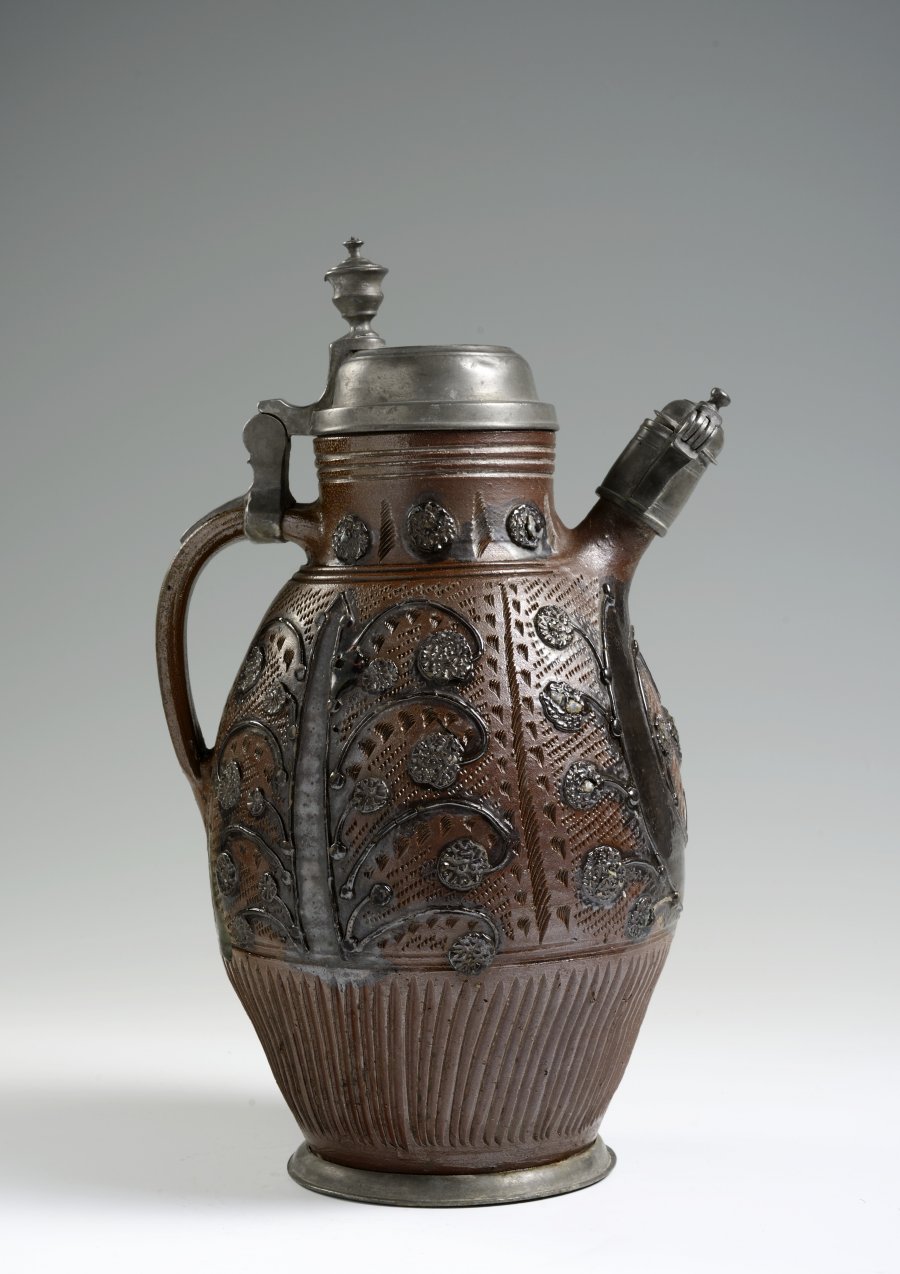 A STONEWARE KETTLE WITH PEWTER MOUNTS