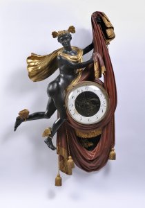 AN EMPIRE WALL CLOCK WITH MERCURY