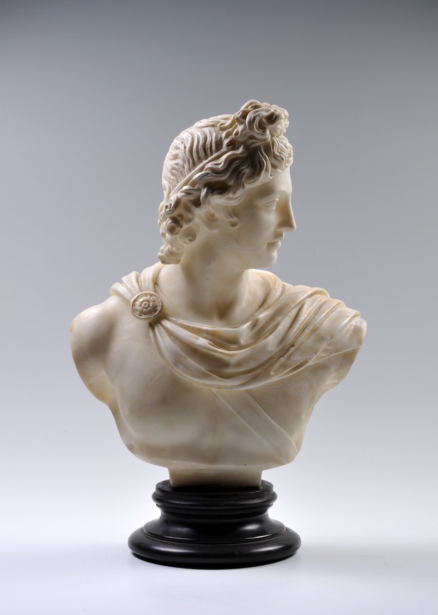 A BUST OF A YOUNG MAN FROM ANTIQUITY