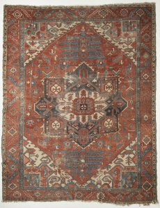 AN ANTIQUE RUG HERIZ