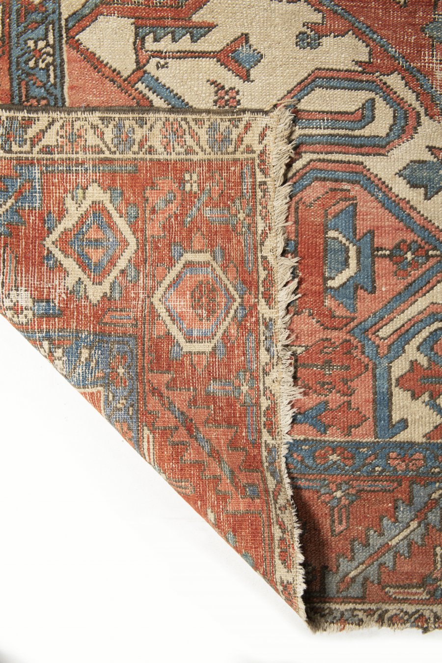 AN ANTIQUE RUG HERIZ