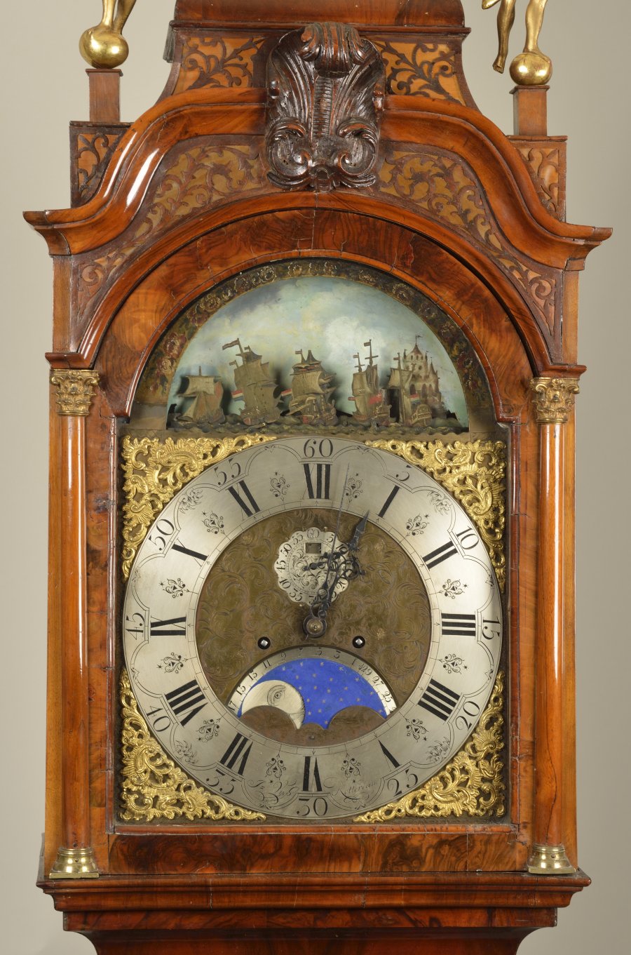 A GRANDFATHER CLOCK