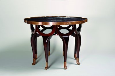 AN "ELEPHANT TRUNK" TABLE