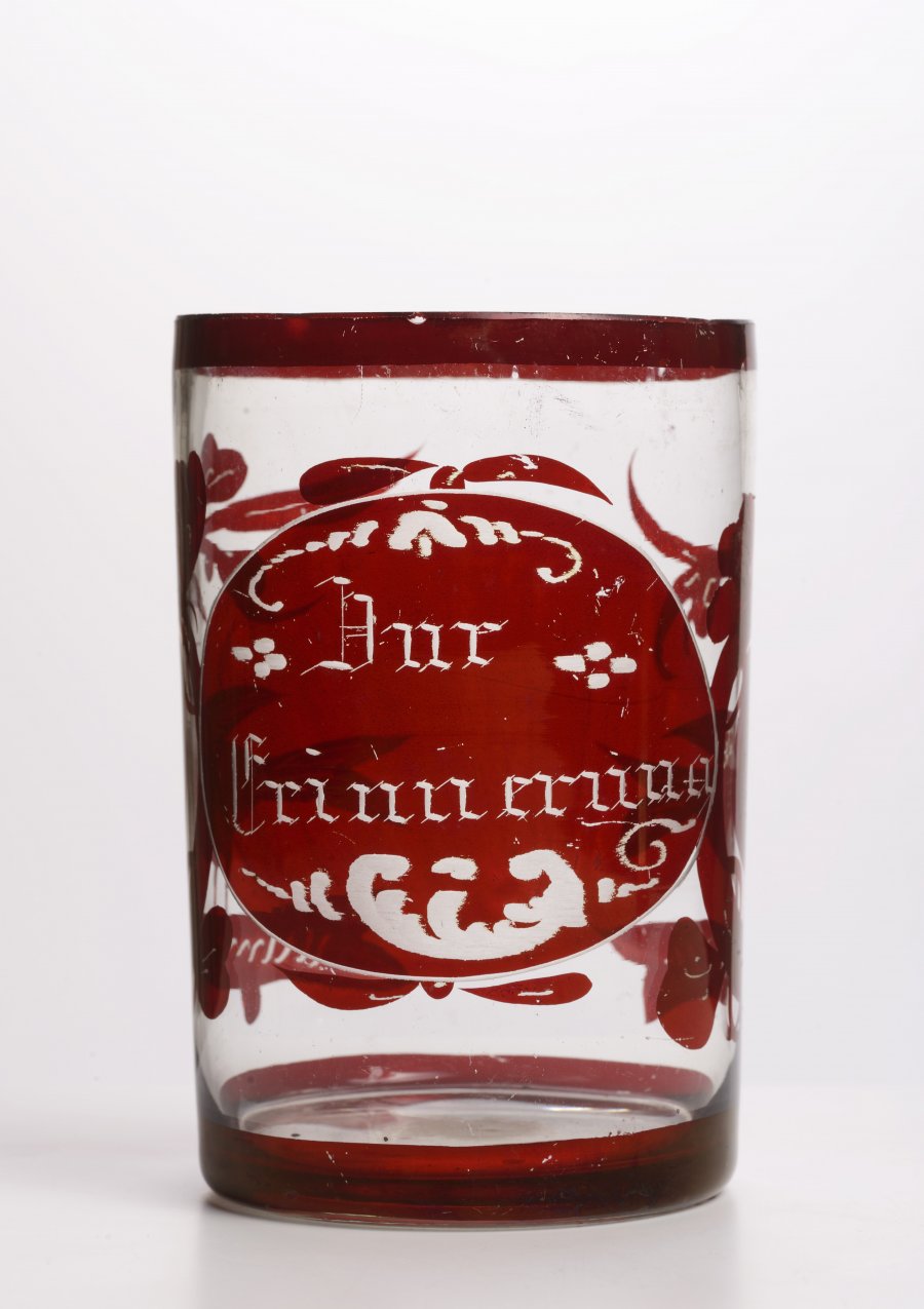 A GROUP OF THREE GLASSES DECORATED WITH RED GLAZE