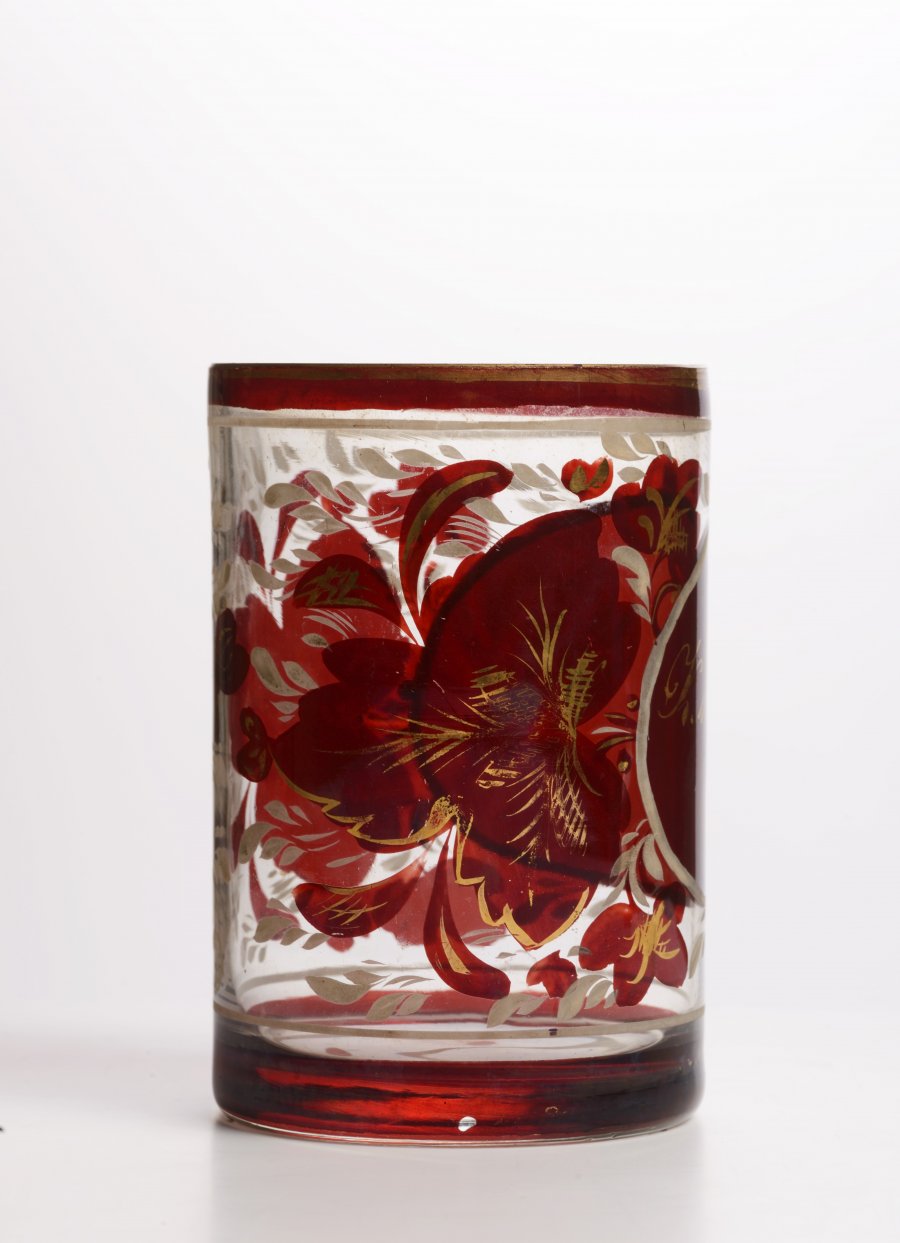 A GROUP OF THREE GLASSES DECORATED WITH RED GLAZE