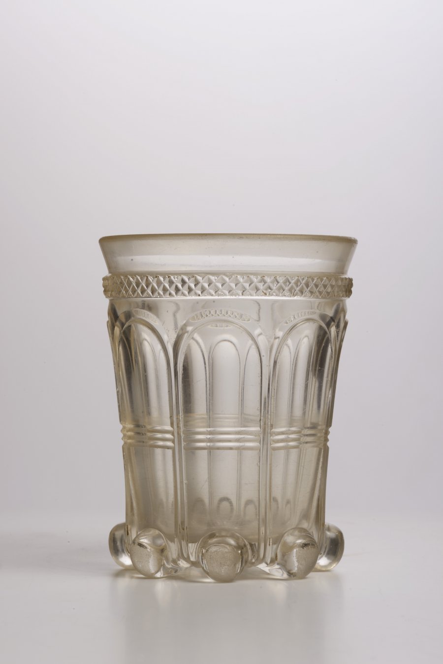 A CLEAR CUT GLASS TUMBLER