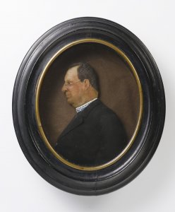 A WAX MINIATURE PROFILE PORTRAIT OF A MAN