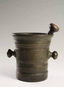 A BRONZE MORTAR AND PESTLE