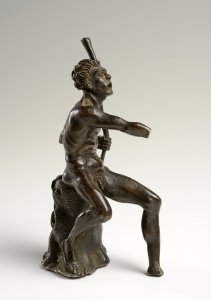 A BRONZE FIGURE OF A SEATED MAN