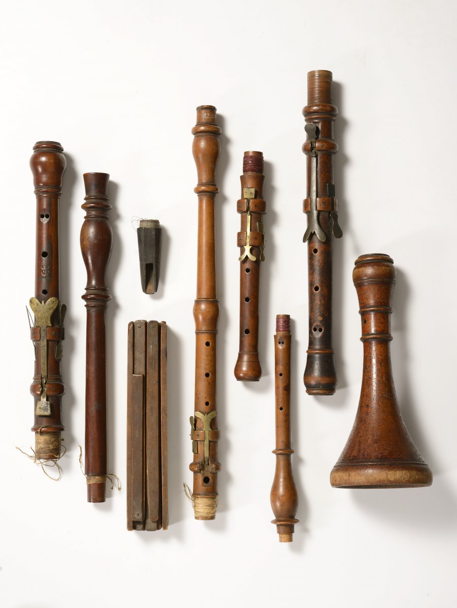 A GROUP OF WOODWIND INSTRUMENT PARTS